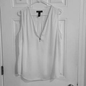 White sleeveless top
